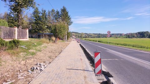 PRZEBUDOWA DROGI WOJEWÓDZKIEJ NR 986 POLEGAJĄCA NA BUDOWIE CHODNIKA W KM  29+960 - 30+248 STRONA LEWA W M. GLINIK